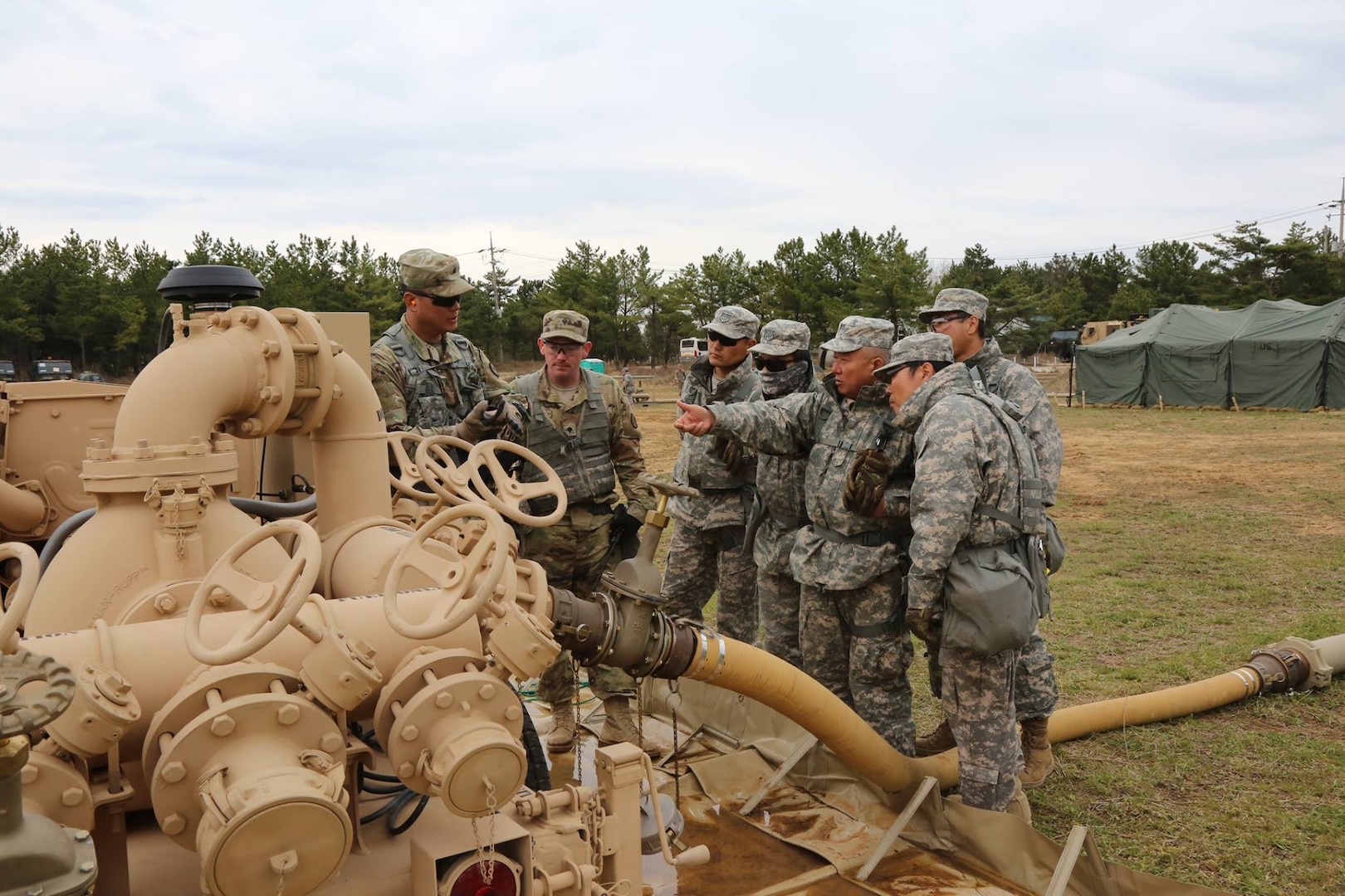 Soldiers of 339th Quartermaster Company, 498th Combat Sustainment Support Battalion and service members of the 22nd Korean Service Corps Company work together to better maintain the Inland Petroleum Distribution System, April 13, 2017. 