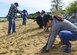 Volunteers plant sea-meadow grass along the James River shoreline on Fort Eustis during Earth Week events at Joint Base Langley-Eustis, Va., April 18, 2017. Approximately 1000 plants were planted to create artificial wetlands, which will help prevent severe flooding and reduce the effects of erosion. (U.S. Air Force photo/Tech. Sgt. Katie Gar Ward)