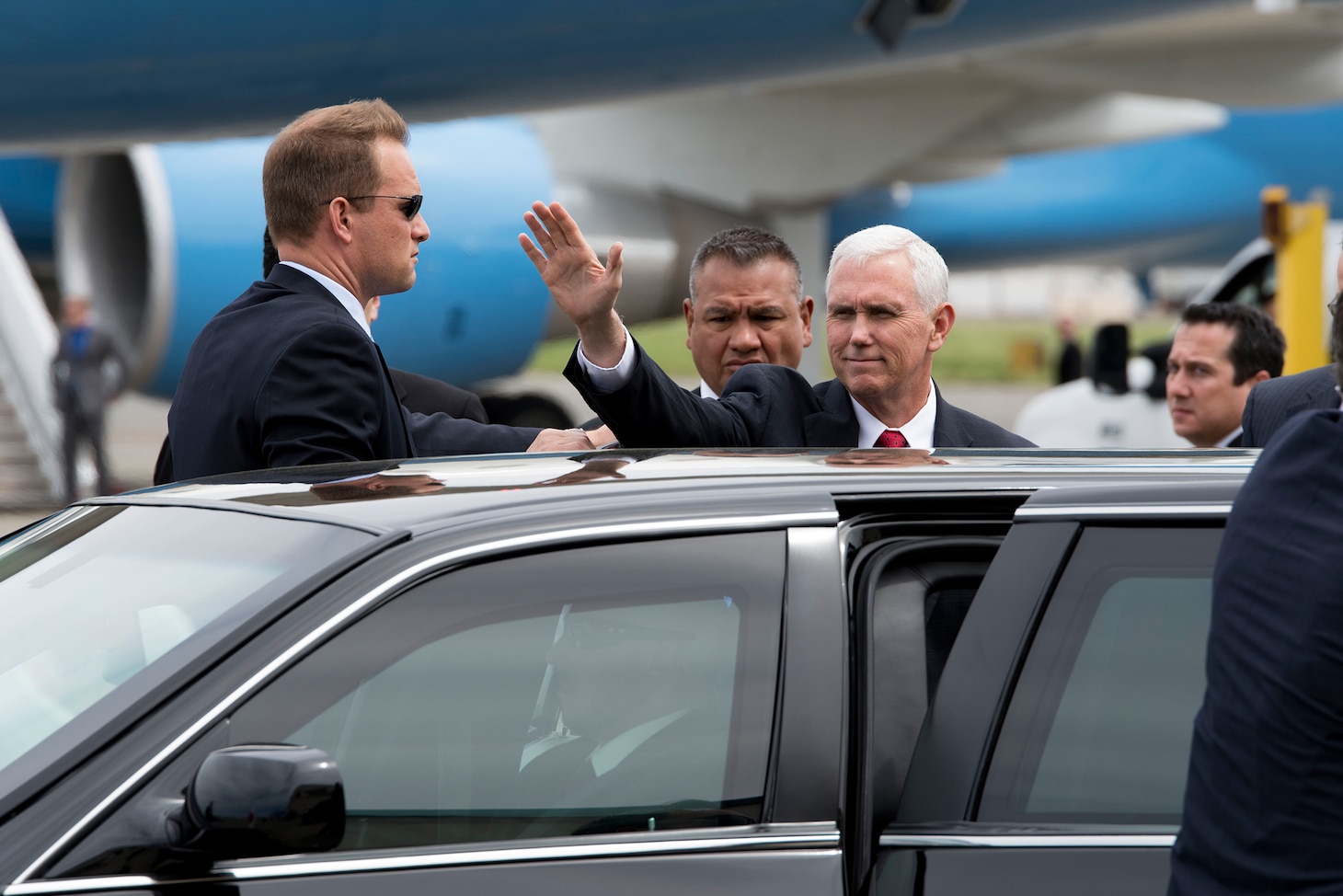 Vice President Mike Pence waves to media before entering his limousine on the flight line at Naval Air Facility Atsugi, Japan, April 18, 2017. The stop marked Pence’s first official visit to Japan as Vice President. During his trip, the Vice President will emphasize President Trump's continued commitment to U.S. alliances and partnerships in the Asia-Pacific region, highlight the Administration's economic agenda, and underscore America's support for our troops at home and abroad.