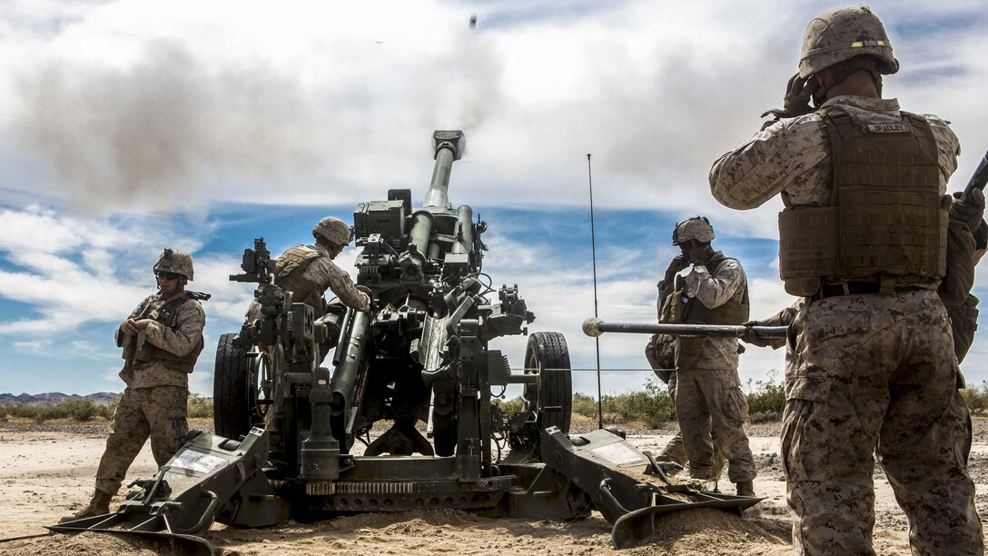 Marines fire an M777 towed 155 mm howitzer during an exercise as part of a weapons and tactics course for instructors at Fire Base Burt, Calif., April 17, 2017. The course emphasizes the operational integration of the six functions of Marine Corps aviation to support a Marine Air Ground Task Force. The Marines are assigned to 1st Battalion, 10th Marine Regiment. Marine Corps photo by Lance Cpl. Clare J. Shaffer