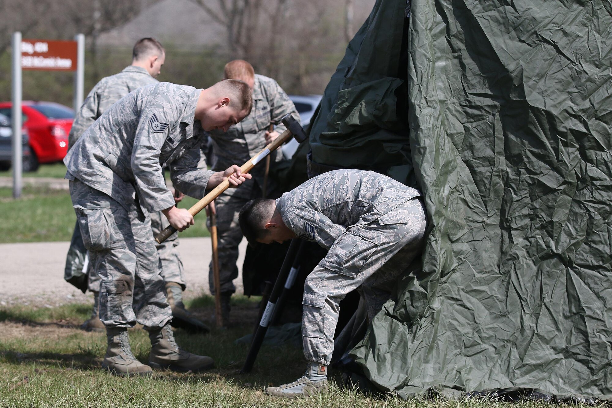 Members of the 445th Security Forces Squadron set up an expedition shelter during the April 2, 2017 unit training assembly. The shelter will be used for a bivouac in preparation for deployment training in May. (U.S. Air Force photo/Tech. Sgt. Patrick O’Reilly)