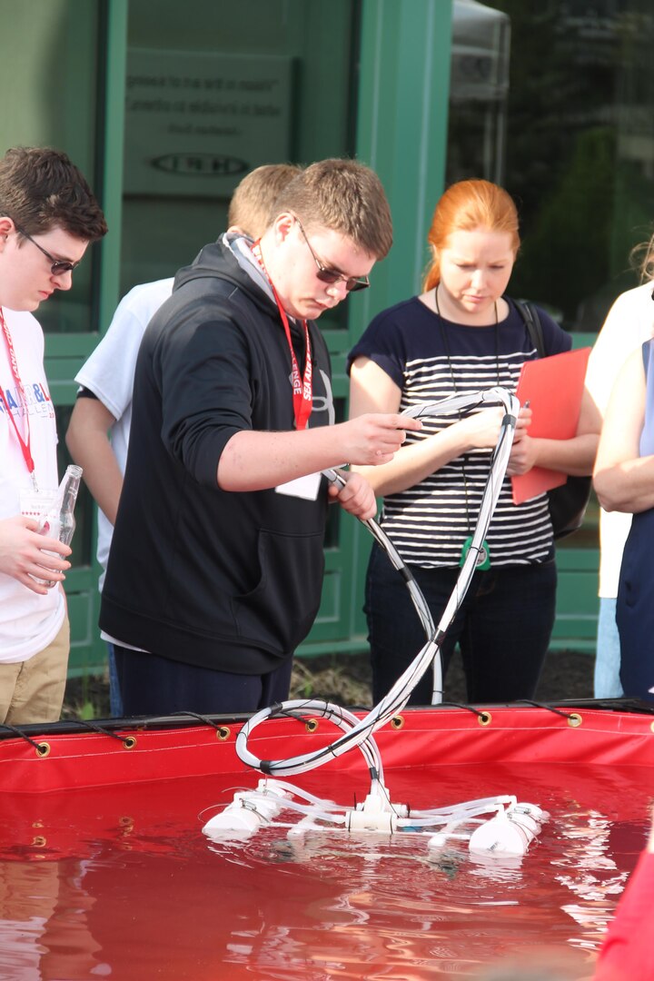 Naval Surface Warfare Center, Crane Division’s (NSWC Crane) Sea, Air and Land Challenge took place Saturday April 15 at Ivy Tech Community College’s main campus in Bloomington. The challenge is a new Science, Technology, Engineering and Math (STEM) initiative with a focus on engineering and robotics that fosters interest in DoD technologies by giving high school students hands-on experience and exposure to the Special Operations community. 