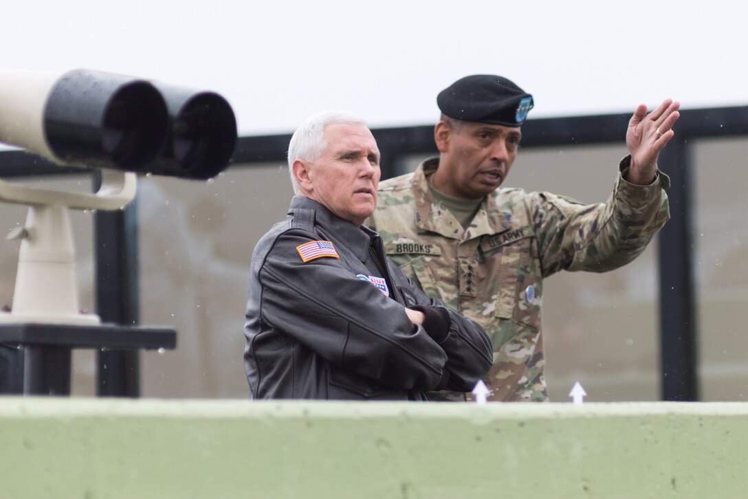 Vice President Mike Pence is briefed by Army Gen. Vincent K. Brooks, the commander of U.S. Forces Korea, Combined Forces Command and United Nations Command, at the Demilitarized Zone between North and South Korea, April 17, 2017. White House photo by D. Myles Cullen