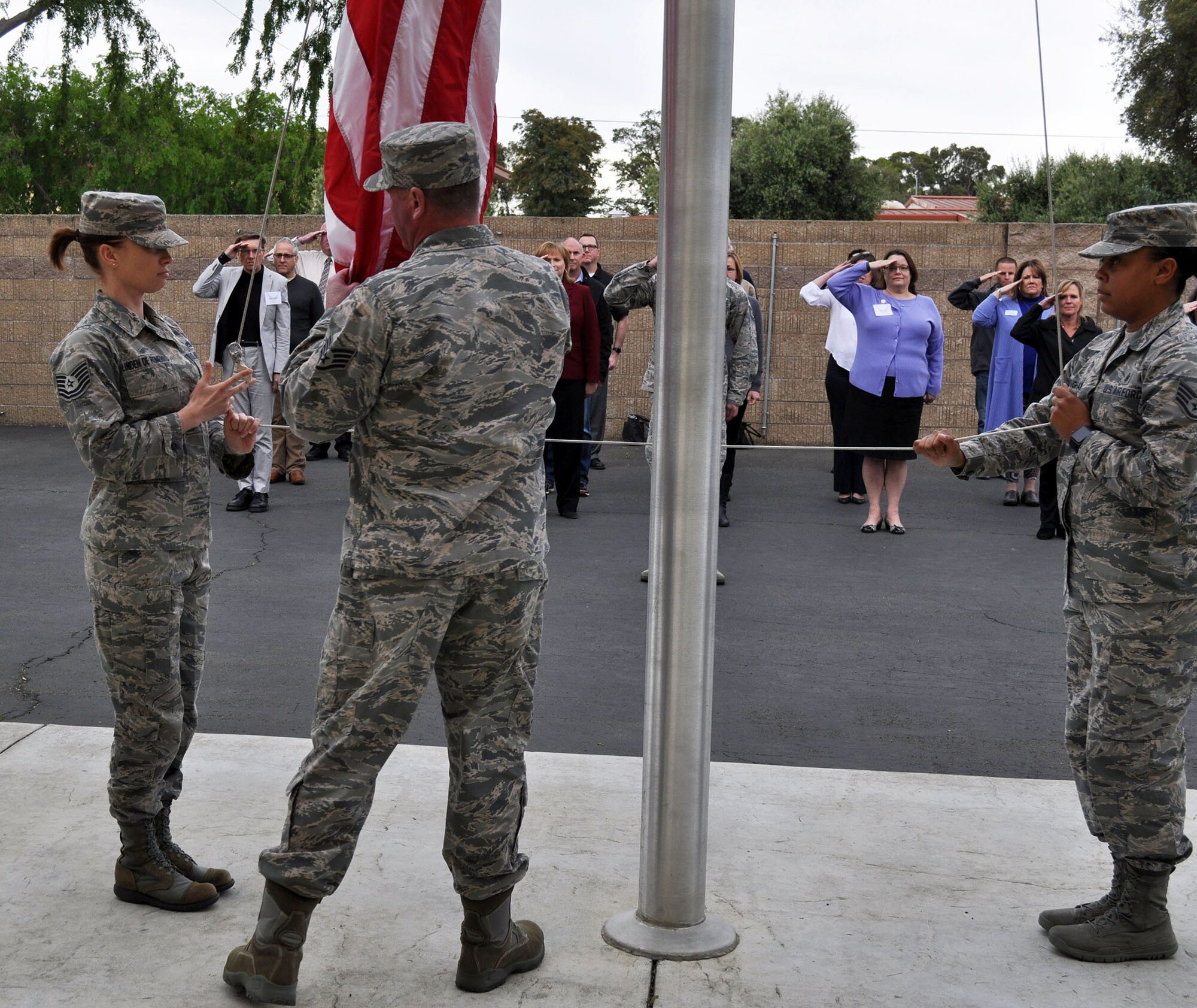 About 25 Honorary Commanders get a little taste of customs and courtesies, drill and a retreat ceremony, and getting up close and personal with some military hardware was on display for the during the Travis Air Force Base 2017 Honorary Commanders Bootcamp April 6, 2017. (U.S. Air Force photo / Ellen Hatfield / released) 