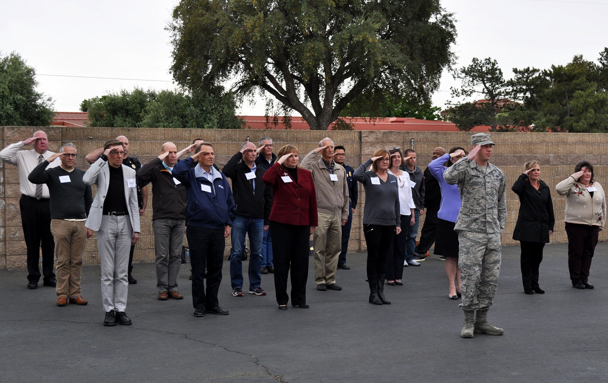 About 25 Honorary Commanders get a little taste of customs and courtesies, drill and a retreat ceremony, and getting up close and personal with some military hardware was on display for the during the Travis Air Force Base 2017 Honorary Commanders Bootcamp April 6, 2017. (U.S. Air Force photo / Ellen Hatfield / released) 