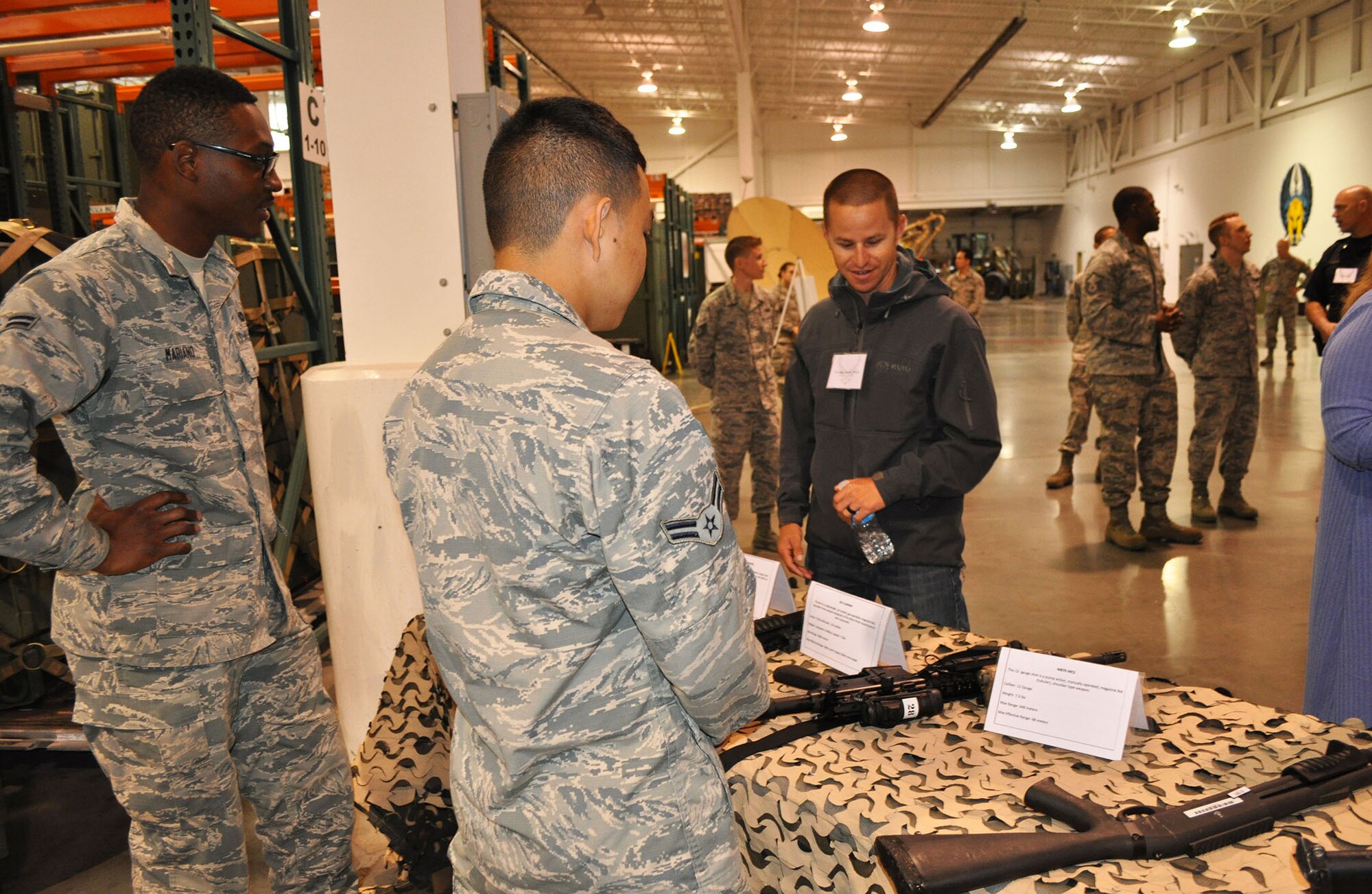 About 25 Honorary Commanders get a little taste of customs and courtesies, drill and a retreat ceremony, and getting up close and personal with some military hardware was on display for the during the Travis Air Force Base 2017 Honorary Commanders Bootcamp April 6, 2017. (U.S. Air Force photo / Ellen Hatfield / released) 
