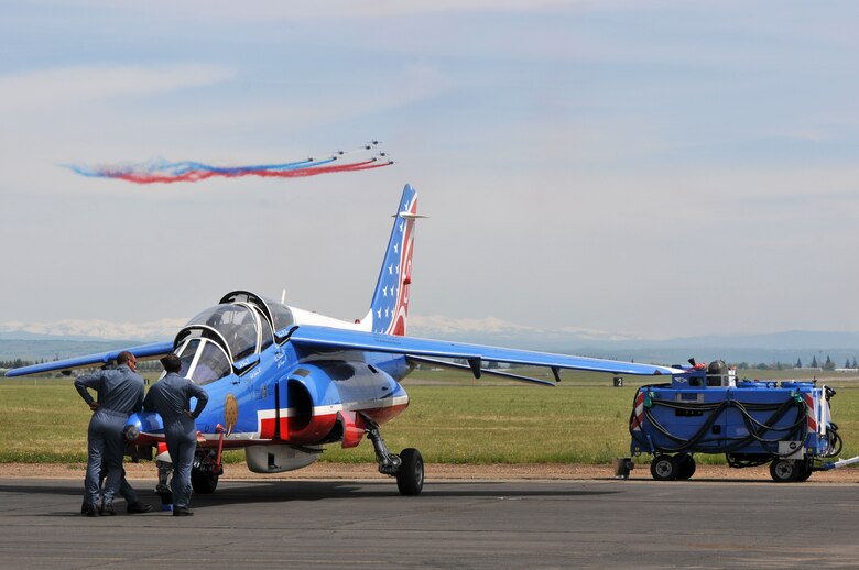 Crew members of Patrouille de France watch an aerial demonstration at Mather Air Field in Sacramento, California, April 15, 2017. (U.S. Air Force photo/Staff Sgt. Rebeccah Anderson)