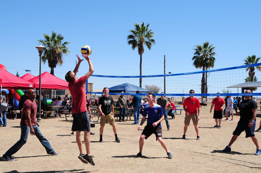 Airmen of the 924th Fighter Group play volleyball during the unit’s family day at Bama Park on Davis-Monthan Air Force Base, Tucson, Ariz.The unit hosted the event to increase camaraderie and give the families a chance to build connections with other families. (U.S. Air Force photo by Tech. Sgt. Courtney Richardson)