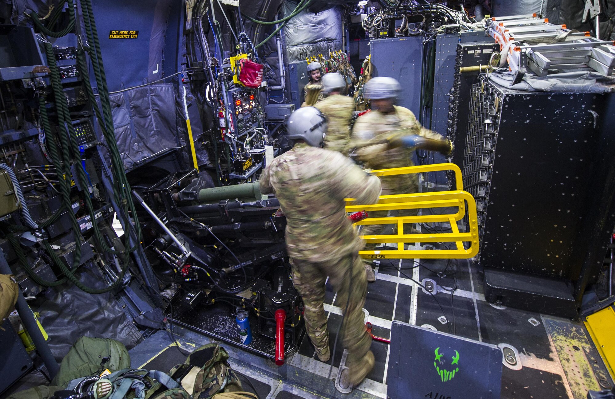 Special missions aviators with the 4th Special Operations Squadron reload the 105mm and 40mm canons on an AC-130U Spooky gunship during a live-fire training mission at the Eglin Range, Fla., April 17, 2017. The AC-130U gunship’s primary missions are close air support, air interdiction and armed reconnaissance. (U.S. Air Force photo by Airman 1st Class Joseph Pick)