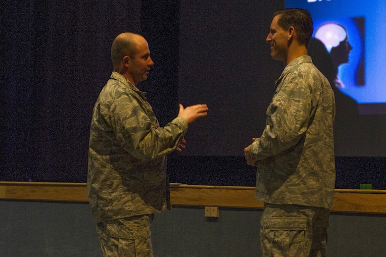 U.S. Air Force Col. Tod Robbins, the 354th Fighter Wing vice commander, speaks with Lt. Col. Regan Patrick, a Profession of Arms Center of Excellence instructor, during a professional development seminar April 13, 2017, at Eielson Air Force Base, Alaska. During the seminar Patrick spoke about personal experiences, shared motivational heritage videos and offered resources to help Airmen become better leaders. (U.S. Air Force photo by Airman 1st Class Isaac Johnson)