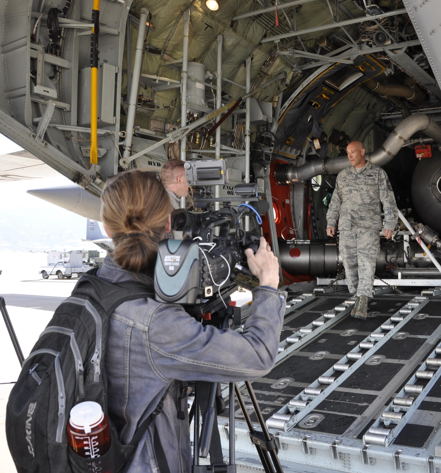 Chief Master Sgt. Jeffrey Flight, 731st Airlift Squadron loadmaster superintendent, meets with members of the news media during the 302nd Airlift Wing’s Modular Airborne Fire Fighting System discharge test at Peterson Air Force Base, Colo., April 18. Members of the news media were invited here to witness the Air Force Reservist’s preparations for the upcoming annual U.S. Forest Service MAFFS certification and recertification training event in Boise, Idaho. (U.S. Air Force photo/Staff Sgt. Frank Casciotta)