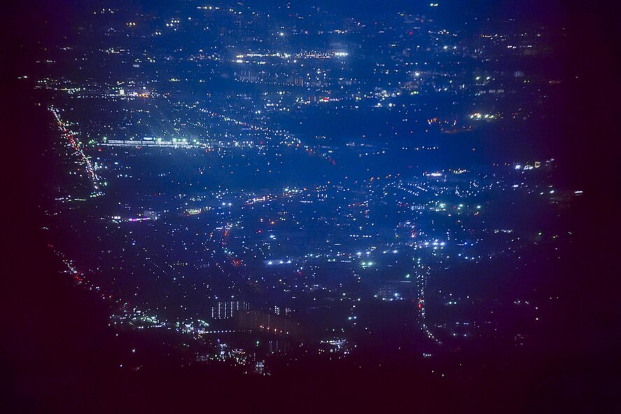A view from a window of a C-130 Hercules on April 13, 2017, at Yokota Air Base, Japan. Members of Air Force Special Operations, Survival, Evasion, Resistance and Escape specialists work for Pacific Air Forces bases gathered for a SERE working group at Yokota to remain current and proficient. (U.S. Air Force photo by Machiko Arita)