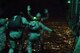 A member of Air Force Special Operations, Survival, Evasion, Resistance and Escape specialists jumps out of a C-130 Hercules while flying over Yokota Air Base, Japan,
April 13, 2017. They performed a high altitude low opening parachute drop. (U.S. Air Force photo by Machiko Arita)