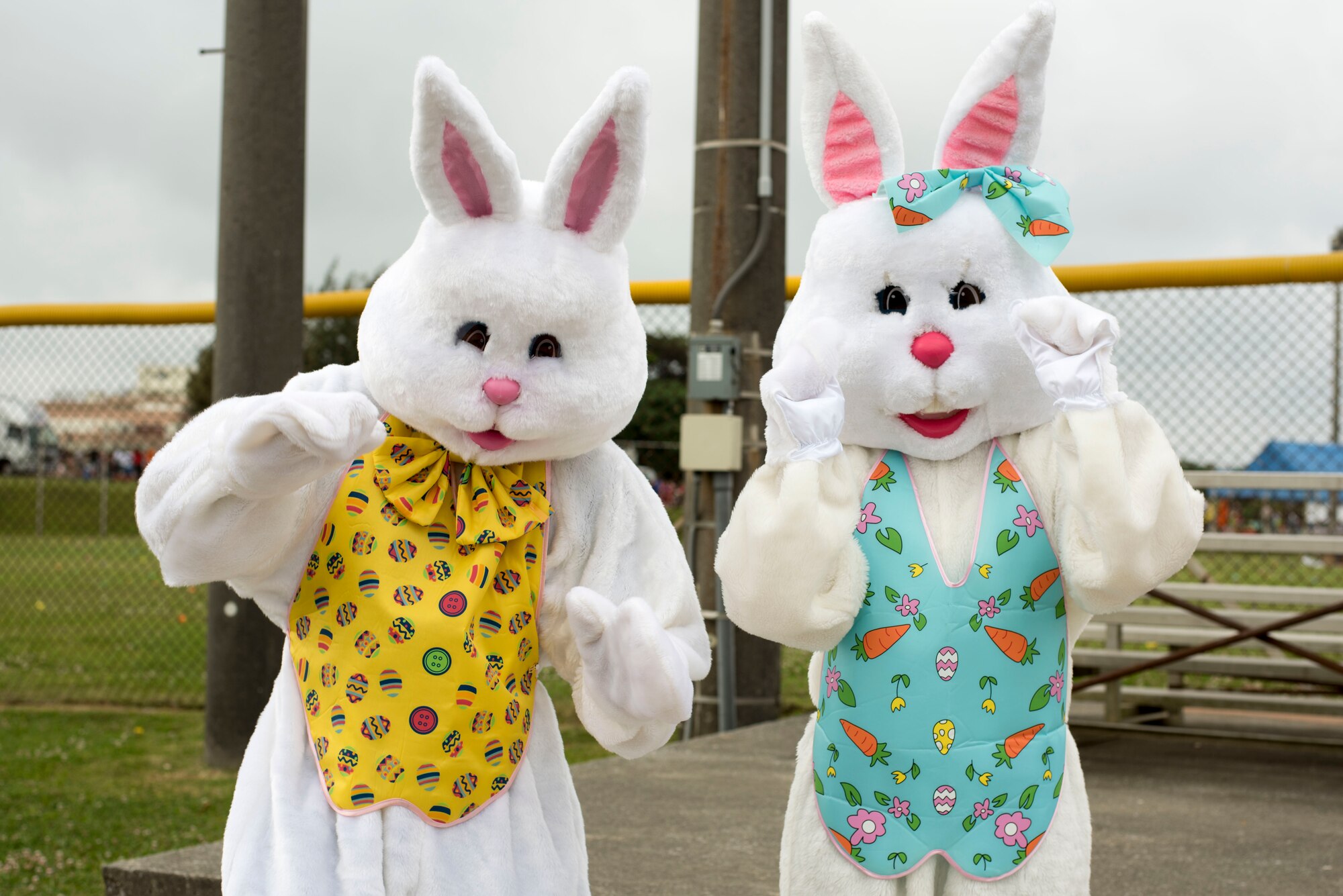 Volunteers dressed as Easter Rabbits meet with families during Eggsplosion April 15, 2017, at Kadena Air Base, Japan. Eggsplosion is an annual event hosted by the 18th Force Support Squadron to raise moral for service members and their families living on Kadena. (U.S. Air Force photo by Senior Airman Omari Bernard/Released)