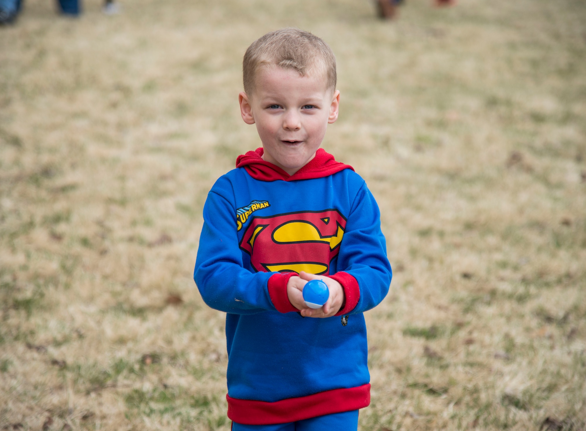 A child focuses while carrying an Easter egg on a spoon at Misawa Air Base, Japan, April 15, 2017. The Base Exchange held an Easter egg hunt, face painting, an egg carrying race and other events for Easter. (U.S. Air Force photo by Senior Airman Brittany A. Chase)