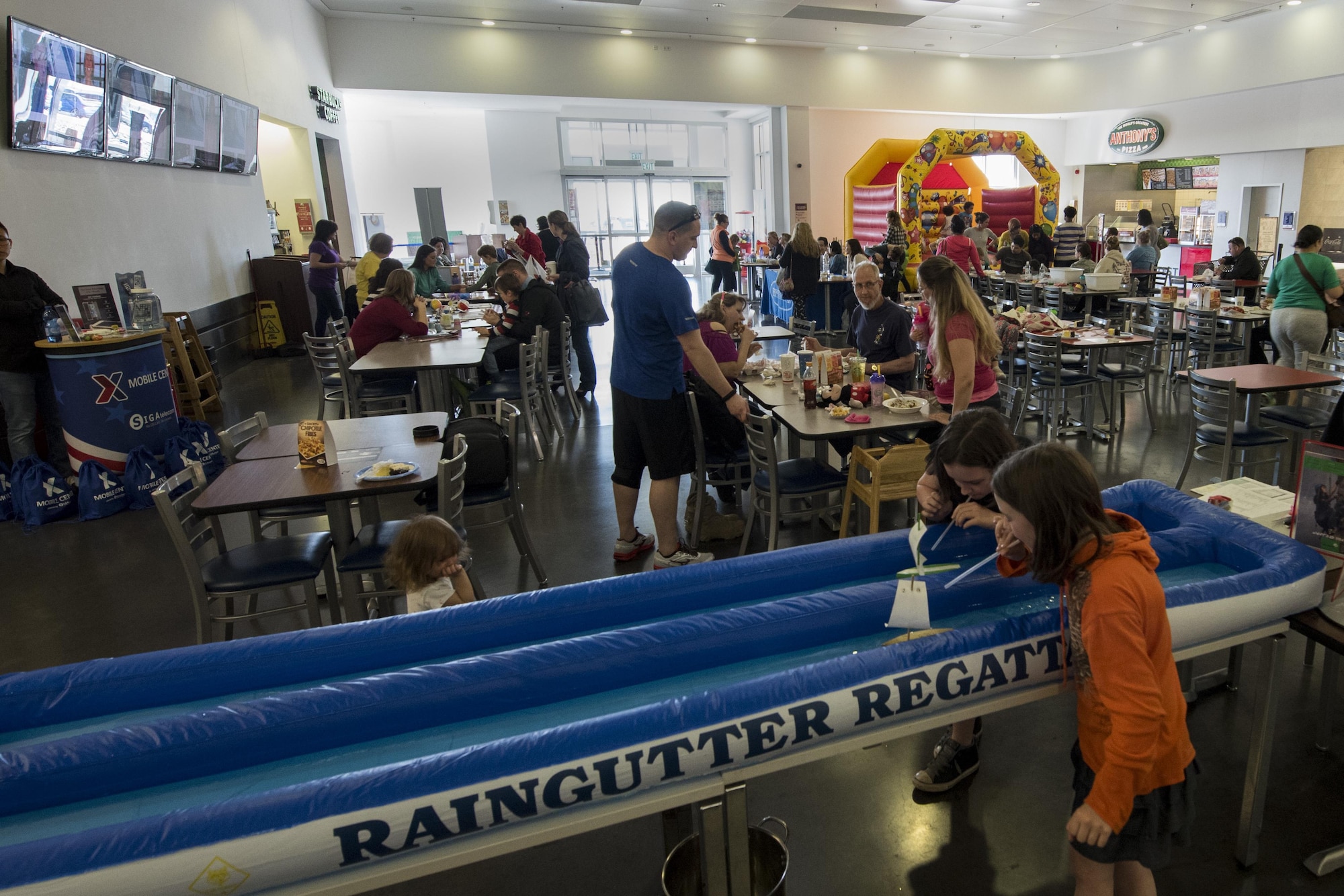 Spangdahlem families participate in activities during the fourth annual Spring Fling event held at the Base Exchange at Spangdahlem Air Base, Germany, April 14, 2017. The event is held annually and serves to bring awareness to the Exceptional Family Member Program during month of the military child. (U.S. Air Force photo by Airman 1st Class Preston Cherry)