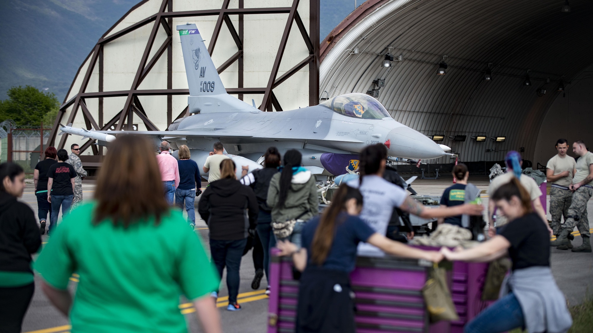 31st Aircraft Maintenance Squadron spouses participate in a Spouses’ Appreciation Day event at Aviano Air Base, Italy, April 12, 2017. The day’s events consisted of a squadron tour, multiple demonstrations of tasks and the ability to perform those tasks 31st AMXS Airmen perform on a day-to-day basis. (U.S. Air Force photo by Senior Airman Cory W. Bush)