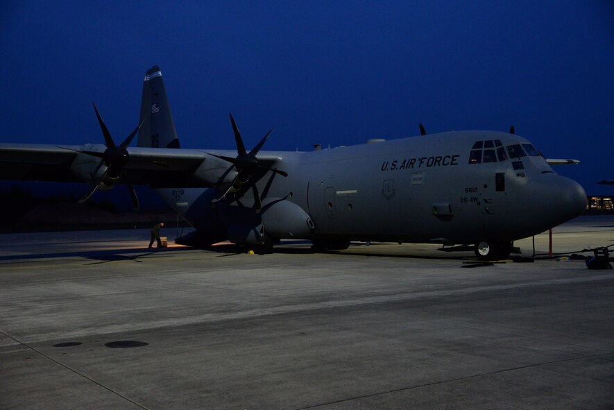 A C-130 aircraft rests on the flightline April 15, on Ramstein Air Base, Germany. The aircraft is scheduled to transport a Tactical Air Navigation system to Romania in support of the theatre security package. (U.S. Air Force photo by Airman 1st Class D. Blake Browning)