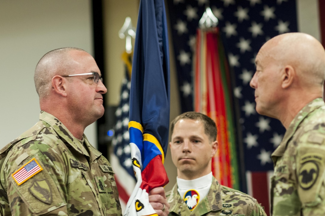 U.S. Army Reserve Command Sgt. Maj. Ted L. Copeland, left, accepts the colors from Lt. Gen. Charles D. Luckey, chief, Army Reserve and U.S. Army Reserve Command commanding general, during a change of responsibility ceremony at the U.S. Army Forces Command and U.S. Army Reserve Command headquarters, April 18, 2017, at Fort Bragg, NC. Copeland takes over the U.S. Army Reserve's top enlisted position after serving as the command sergeant major of the 79th Sustainment Support Command in Los Alamitos, Calif. (U.S. Army photo by Timothy L. Hale/Released)