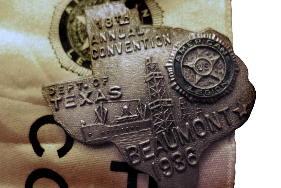 Pin identifying Bell as a member of the reception committee for the 1936 American Legion conference in Beaumont, Texas, where he settled after the war. Medal depicts Spindletop oil well and Navy ship being built in harbor.