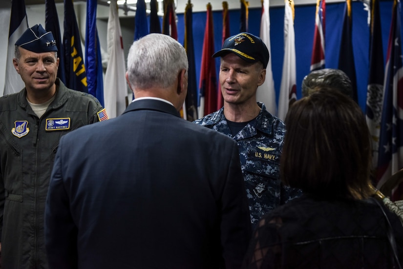 Navy Vice Adm. Joseph Aucoin, the commander of U.S. 7th Fleet, greets Vice President Mike Pence aboard the aircraft carrier USS Ronald Reagan in Yokosuka, Japan, April 19, 2017. Navy photo by Petty Officer 2nd Class Jamal McNeill