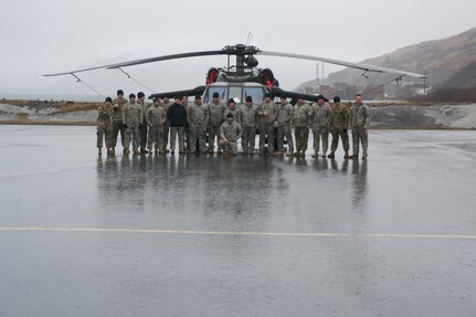 Alaska Army National Guard Aviation Soldiers pose for a photograph in front of a UH-60 Blackhawk helicopter in April. Soldiers from 1st Battalion, 207th Aviation Regiment, and 2-104th General Support Aviation Battalion, were in Kodiak supporting Arctic Care 2017, a multi-service health care training exercise supporting communities in rural Alaska.  