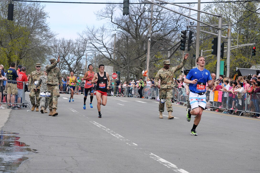 Massachusetts National Guardsmen joined civilians in participating in the 121st Boston Marathon in Hopkinton, Mass., April 17, 2017. Army National Guard photo by Sgt. Michael V. Broughey