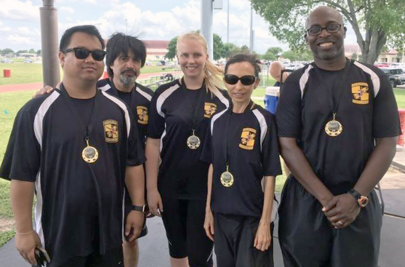 The 5th Brigade ROTC Team consisted of (from left) Brian Edwards, Martin Lopez, Allison Miller, Amy Fields and Thaddeus Chase (Capt. Katrina Clark not pictured).