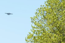 A B-25 bomber flies over the National Museum of the United States Air Force, April 18, 2017 as part of the 75th Anniversary of the Doolittle Raid Memorial Ceremony. Eleven privately owned World War II era bombers participated in the event attended by the last living Raider, Lt. Col. (Ret.) Richard Cole, who was a participant in the memorial ceremony. (U.S. Air Force photo/Wesley Farnsworth)