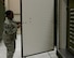 Master Sgt. Jessica Young, aircraft parts store and mobility readiness spares parts section chief assigned to the 28th Logistics Readiness Squadron, opens an Internal Slingable Unit on the flight line at Ellsworth Air Force Base, S.D., April 12, 2017. The 28th LRS received an updated model of the unit on April 10, 2017, which incorporates installed drawers that allow for consumable materials to be transported. (U.S. Air Force photo by Airman Nicolas Z. Erwin)