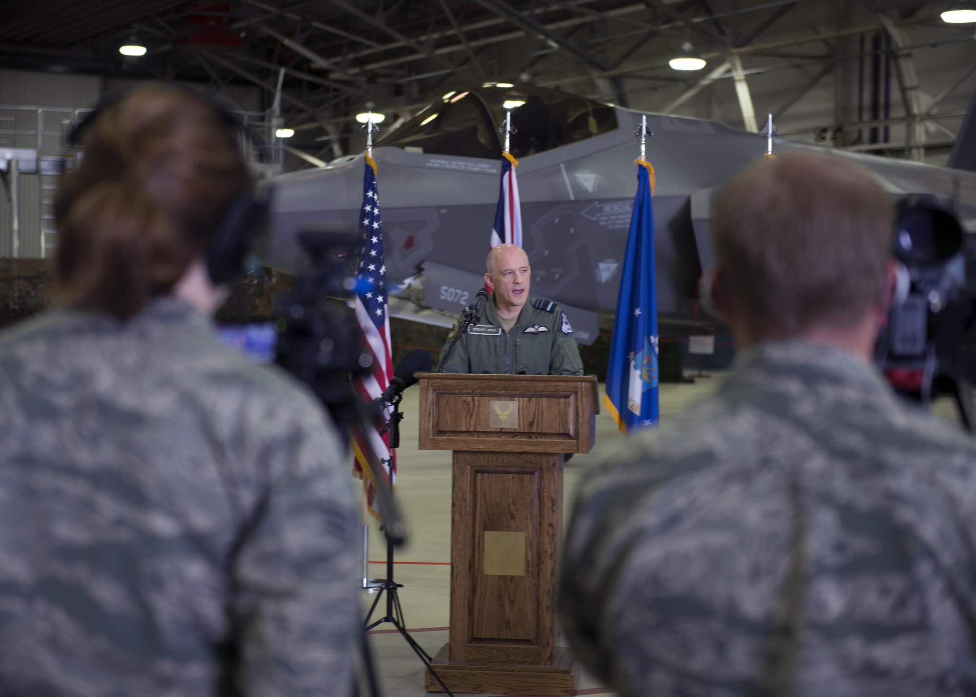 Royal Air Force Air Marshal Stuart Atha, Deputy Commander Operations, speaks during a press conference at Royal Air Force Lakenheath, England, April 19, 2017. At the press conference, an F-35 Lightning II, an F-15C Eagle, and an RAF Typhoon FGRA were on display. (U.S. Air Force photo/Senior Airman Malcolm Mayfield)
