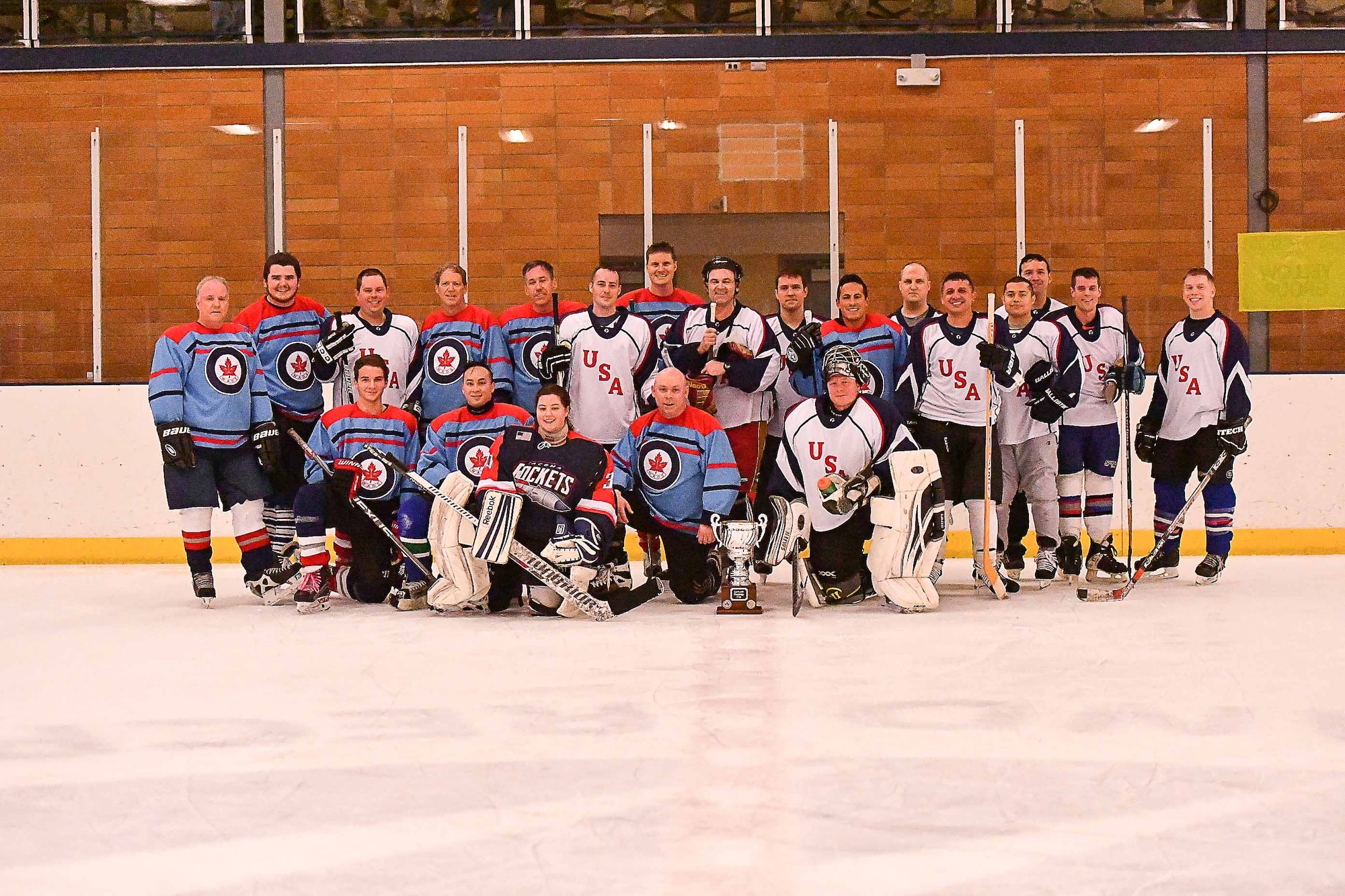 Canada wins the 23rd annual Western Air Defense Sector's Canada USA Hockey Classic 8-1.  Team Canada players are Todd Rose #5, Kenneth Mui #8, Curtis Berkman #12, Marcelo Plada #14, Richard Martin #4, Gilles Turgeon #13, Brian Berkman #16, Brian Kynaston #2, Brandon Berkman #15, and Lillian Gebhardt #30.  

Team USA players are Mike Delany #10,  Bryan Bein #2, Chris Pavel #12, Nick Wysong #9, Matt Berube #11, Christopher LaCour #5, James Bandy #3, Sean Leffler #7, Seth Beattie #4,  John Austin #1, Ty Henrichsmeyer #29, Diego Acevedo Veloza #14, Aaron Andrews #8, and Jason Muller #6.  (U.S. Air Force photo by Capt. Kimberly D. Burke)