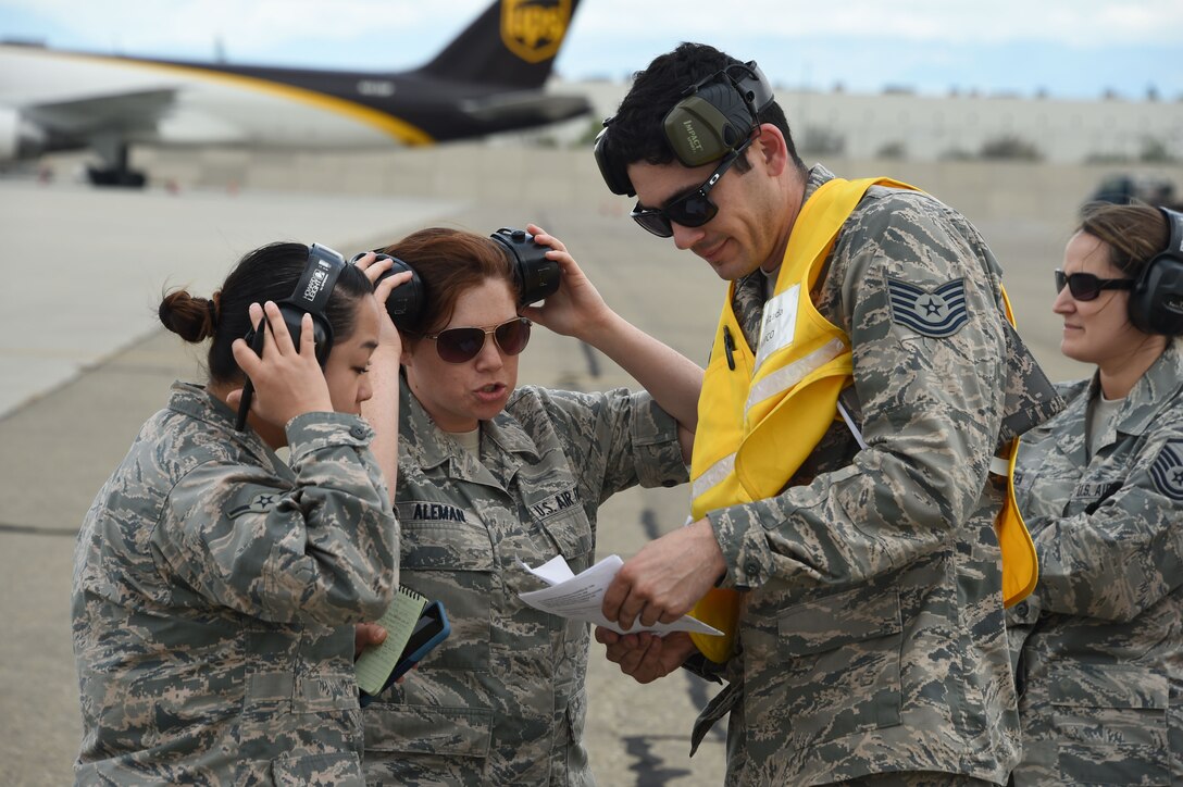 U.S. Airmen from the California Air National Guard’s 144th Fighter Wing discuss the load plan for a C-17 Globemaster III in support of Sentry Aloha 17-03. Sentry Aloha is an Air Guard led exercise that provides a current, realistic, and integrated training environment to the U.S. Air Force and joint partners. (Air National Guard photo by Senior Master Sgt. Chris Drudge)