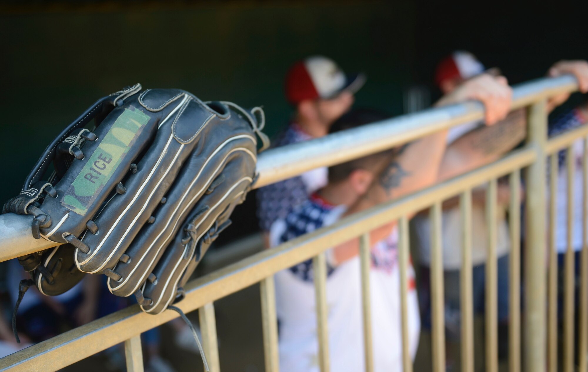 Wounded Warrior Amputee Softball Team members watch the WWAST game from the dugout in Newport News, Va., April 15, 2017. The team hopes to inspire and educate others on the ability to rise above personal adversities, and that “life without limbs is limitless.” (U.S. Air Force photo/Airman 1st Class Kaylee Dubois)