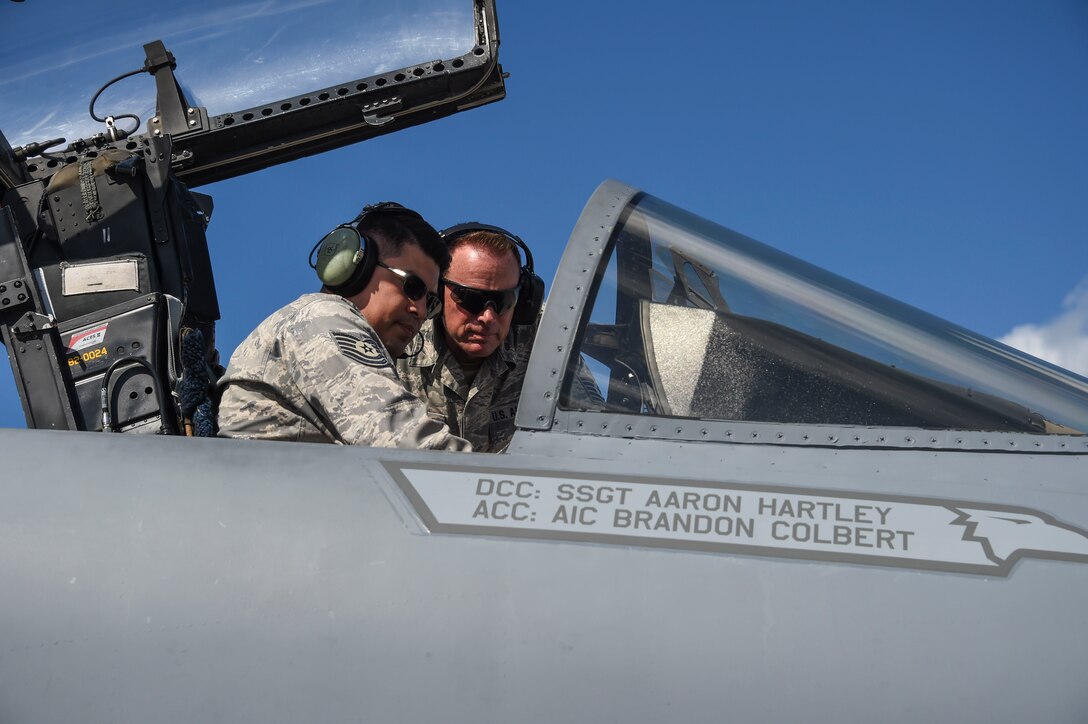 U.S. Air Force Tech. Sgt. Jason Fregoso (left) and Master Sgt. Jeffrey Robbins, both from the 144th Aircraft Maintenance Squadron, troubleshoot a faulty fuel quantity indicator on a 144th Fighter Wing F-15C Eagle during Sentry Aloha 17-03, April 5, 2017. Sentry Aloha is an Air Guard led exercise that provides a current, realistic, and integrated training environment to the U.S. Air Force and joint partners. (Air National Guard photo by Senior Master Sgt. Chris Drudge)
