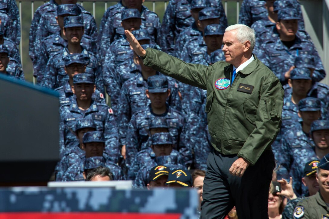 Vice President Mike Pence greets service members on the flight deck of the USS Ronald Reagan in Yokosuka, Japan, April 19, 2017. Navy photo by Petty Officer 3rd Class James Lee