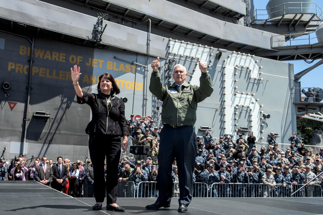 Vice President Mike Pence and his wife, Karen Pence, thank service members on the flight deck of the USS Ronald Reagan in Yokosuka, Japan, April 19, 2017. Navy photo by Petty Officer 2nd Class Nathan Burke