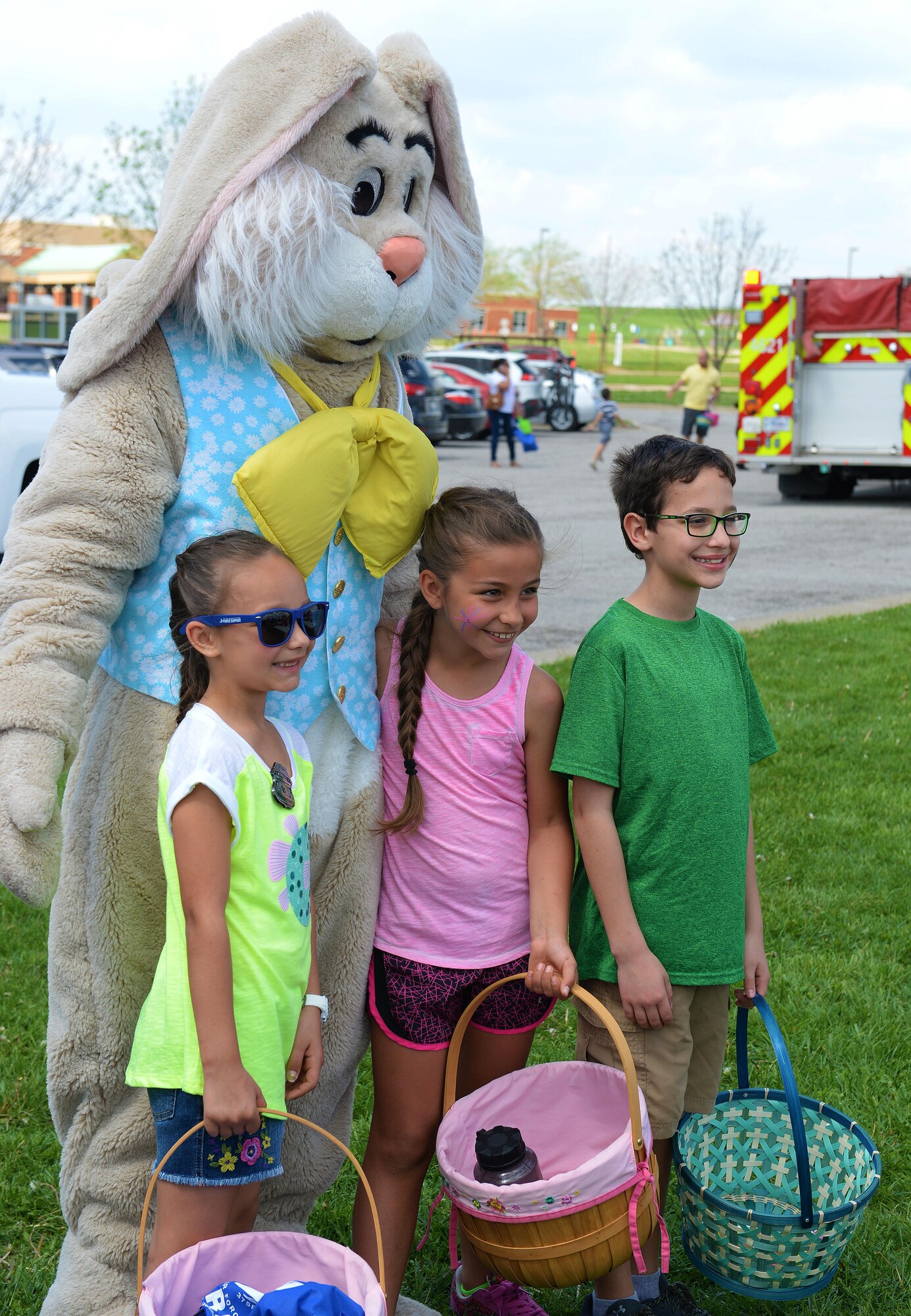 Team Scott families partake in many fun activities at the Egg Hunt Egg-Stravaganza, hosted by the 375th Force Support Squadron, Scott Air Force Base, Ill., April 15, 2017. The free event at the Scott AFB Youth Center included egg hunts for different age groups, Easter bunny, bounce houses, face painting, prizes, food from the USO, sack races, and a Security Forces vehicle display. (U.S. Air Force photo by Senior Airman Erica Fowler)