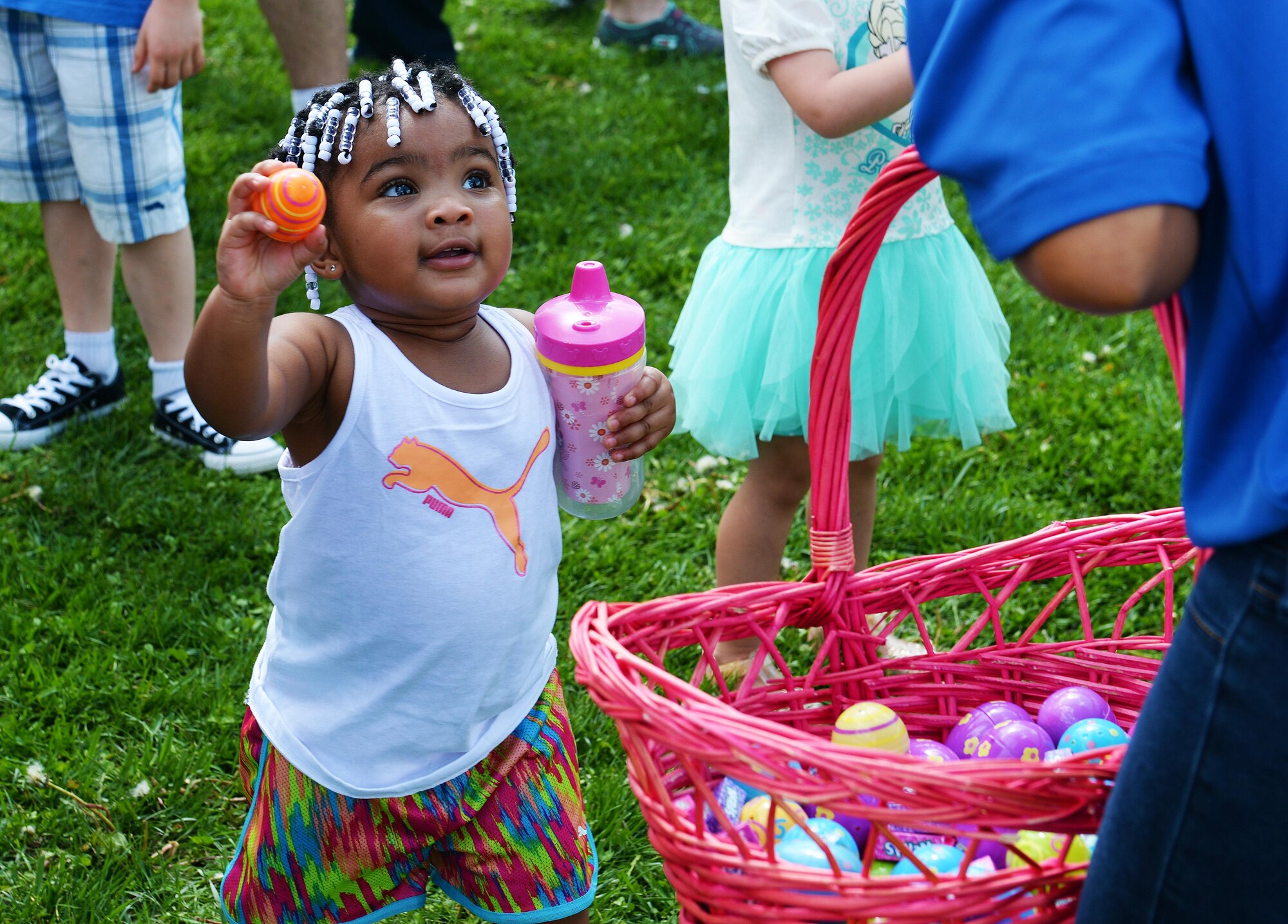 Team Scott families partake in many fun activities at the Egg Hunt Egg-Stravaganza, hosted by the 375th Force Support Squadron, Scott Air Force Base, Ill., April 15, 2017. The free event at the Scott AFB Youth Center included egg hunts for different age groups, Easter bunny, bounce houses, face painting, prizes, food from the USO, sack races, and a Security Forces vehicle display. (U.S. Air Force photo by Senior Airman Erica Fowler)