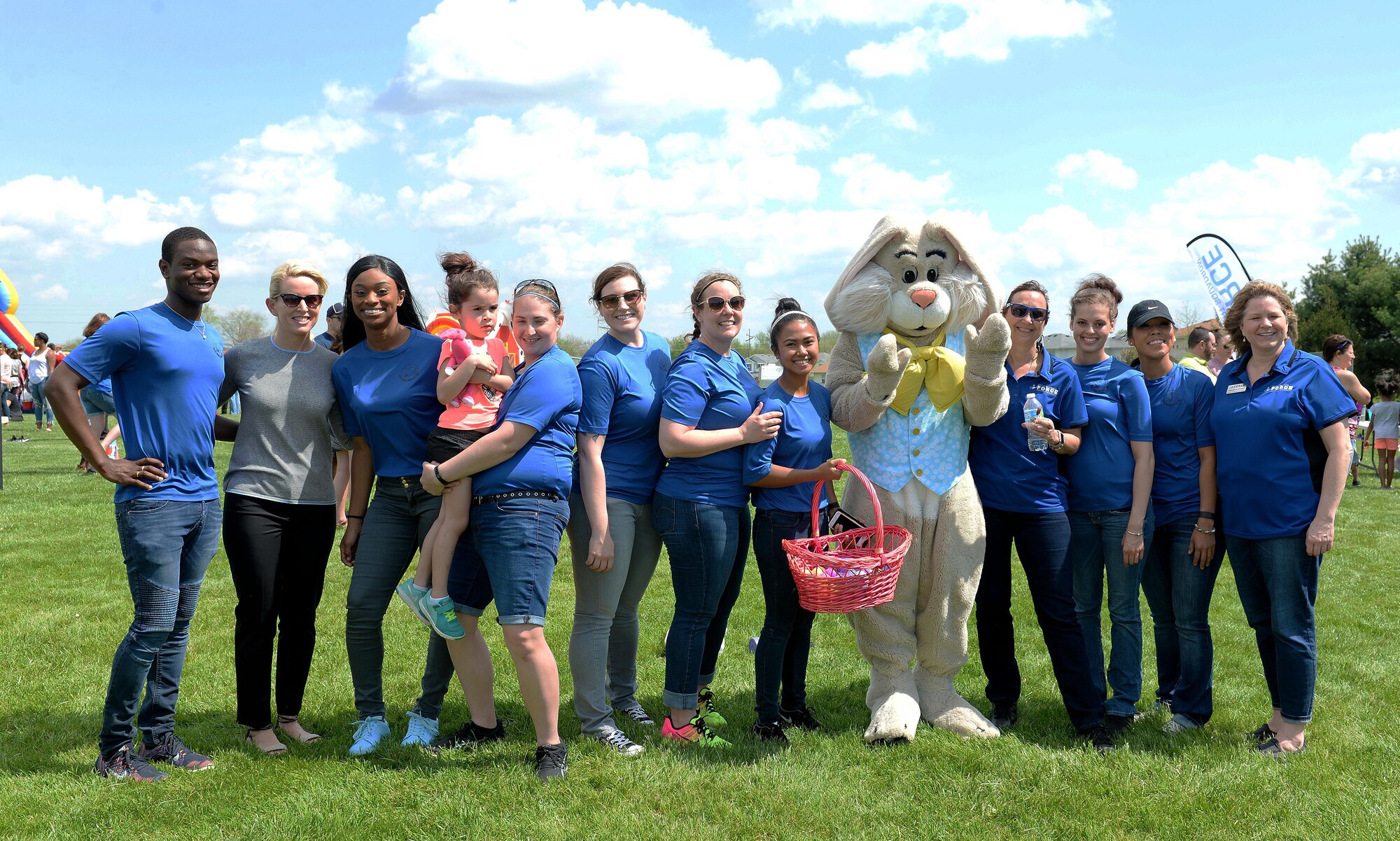 Egg Hunt Egg-Stravaganza volunteers and Col. Laura Lenderman, 375th Air Mobility Wing Commander, pose for a photo with the Easter Bunny, Scott Air Force Base, Ill., April 15, 2017. The 375th Force Support Squadron, Scott AFB Youth Programs and many volunteers put together this event for Team Scott families. (U.S. Air Force photo by Senior Airman Erica Fowler)