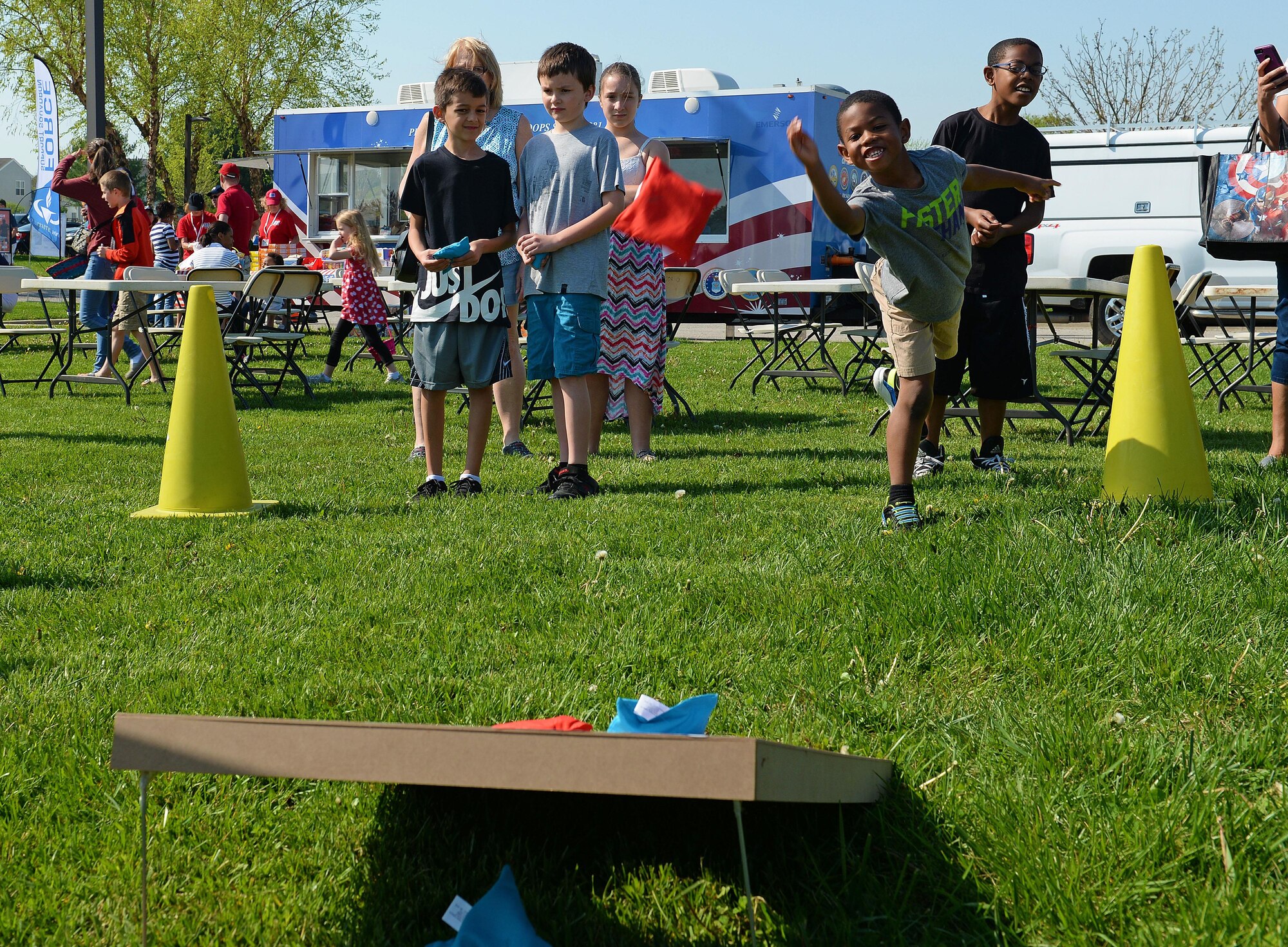 Team Scott families partake in many fun activities at the Egg Hunt Egg-Stravaganza, hosted by the 375th Force Support Squadron, Scott Air Force Base, Ill., April 15, 2017. The free event at the Scott AFB Youth Center included egg hunts for different age groups, Easter bunny, bounce houses, face painting, prizes, food from the USO, sack races, and a Security Forces vehicle display. (U.S. Air Force photo by Senior Airman Erica Fowler)