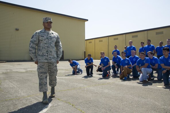 Tech. Sgt. Marc Gayden, Beale Honor Guard team lead, demonstrates a facing movement for the 940th Air Refueling Wing’s Development and Training Flight April 9, 2017, at Beale Air Force Base, California. Gayden spent five years as a basic military training instructor at Joint Base San Antonio-Lackland, Texas. (U.S. Air Force photo by Senior Airman Tara R. Abrahams)