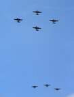 World War II era B-25s fly over the National Museum of the United States Air Force at Wright-Patterson Air Force Base, Ohio, April 18, 2017, on the 75th anniversary of the Doolittle Raid on Japan. The flyover marked the start of a memorial service commemorating the raid. (U.S. Air Force photo by R.J. Oriez)