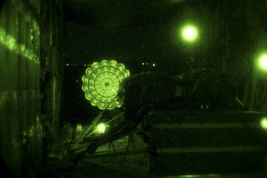 An HC-130J Combat King II from the 71st Rescue Squadron drops a training bundle, April 18, 2017, above Moody Air Force Base, Ga. The training bundle weighed approximately 3,000 pounds and is designed to simulate a heavy equipment air drop. This training helps the 71st RQS remain ready to provide rapidly deployable, expeditionary personnel recovery forces to theater commanders for contingency response operations worldwide. (U.S. Air Force photo by Tech. Sgt. Zachary Wolf)
