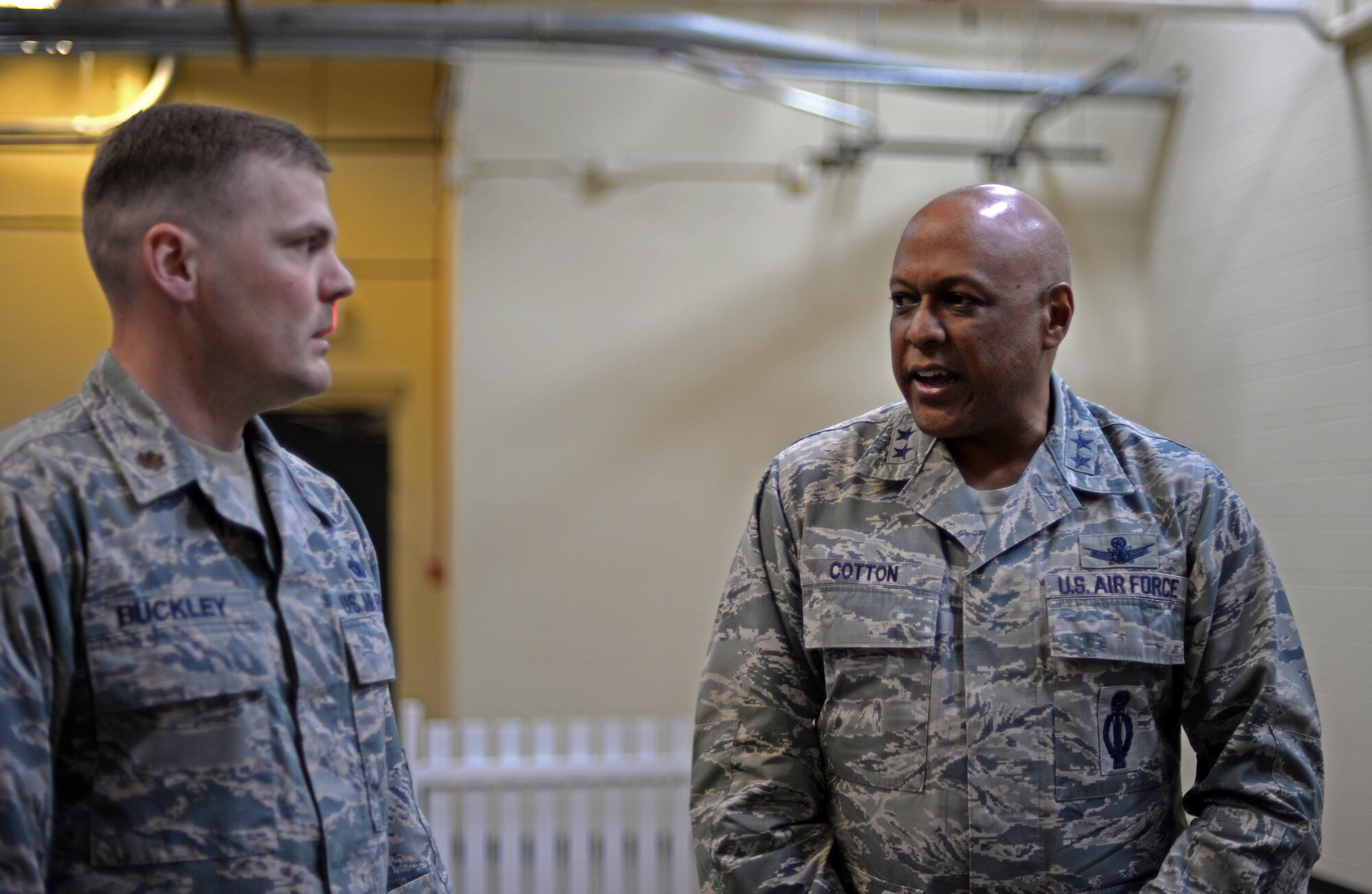 Maj. Gen. Anthony Cotton, 20th Air Force commander, speaks with Major Richard Buckley, 5th Security Forces Squadron deputy commander, at Minot Air Force Base, N.D., April 28, 2017. Cotton took command of the 20th Air Force and Task Force 214 Nov. 16, 2015. (U.S. Air Force photo/Airman 1st Class Austin M. Thomas)