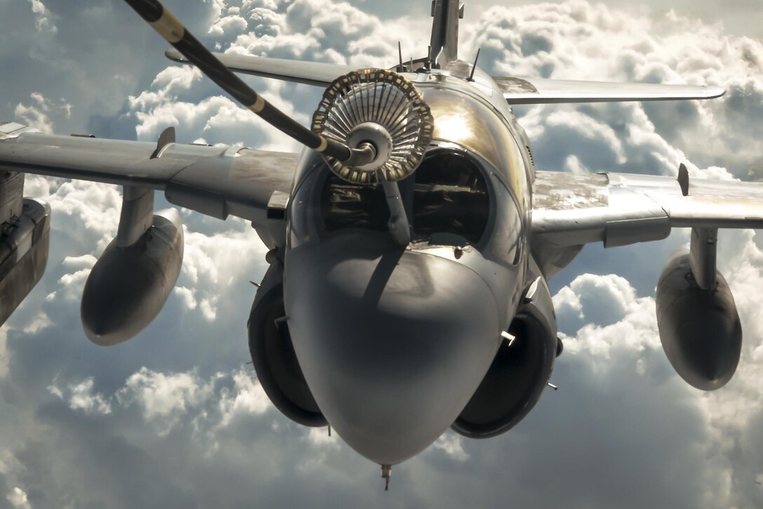 A Navy EA-6B Prowler refuels from an Air Force KC-10 Extender from the 908th Expeditionary Air Refueling Squadron during a Combined Joint Task Force Operation Inherent Resolve mission, March 20, 2017. The EA-6B provides an umbrella of protection for strike aircraft, ground troops and ships by jamming enemy radar, electronic data links and communications. Air Force photo by Senior Airman Joshua A. Hoskins