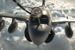 A Navy EA-6B Prowler refuels from an Air Force KC-10 Extender from the 908th Expeditionary Air Refueling Squadron during a Combined Joint Task Force Operation Inherent Resolve mission, March 20, 2017. The EA-6B provides an umbrella of protection for strike aircraft, ground troops and ships by jamming enemy radar, electronic data links and communications. Air Force photo by Senior Airman Joshua A. Hoskins