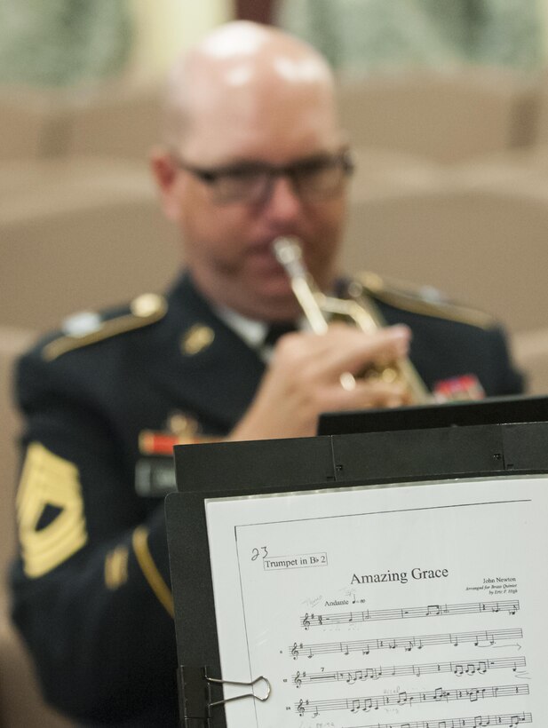 The 82nd Airborne Division All American Brass Quintet plays "Amazing Grace" as U.S. Army Reserve Soldiers and civilians remembered Maj. Gen. Franciso A. Espaillat during a memorial ceremony at the U.S. Army Reserve Command headquarters, April 19, 2017, at Fort Bragg, N.C. Espaillat, 56, from New York City, was slated to become the next U.S. Army Reserve Command chief of staff. He previously served as the commanding general of the 143rd Sustainment Command (Expeditionary), in Orlando, Fla. Espaillat died April 7, 2017, at Fort Bragg. (U.S. Army photo by Timothy L. Hale/Released)