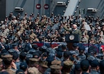 Vice President Michael R. Pence addresses service members on the flight deck of the Navy's forward-deployed aircraft carrier, USS Ronald Reagan (CVN 76), April 19, 2017. The vice president's tour of the ship and his remarks to U.S. and Japanese service members highlighted the administration's continuing commitment to rebuilding the U.S. military and to its alliances in the region. Ronald Reagan, the flagship of Carrier Strike Group 5, provides a combat-ready force that protects and defends the collective maritime interests of its allies and partners in the Indo-Asia-Pacific region.