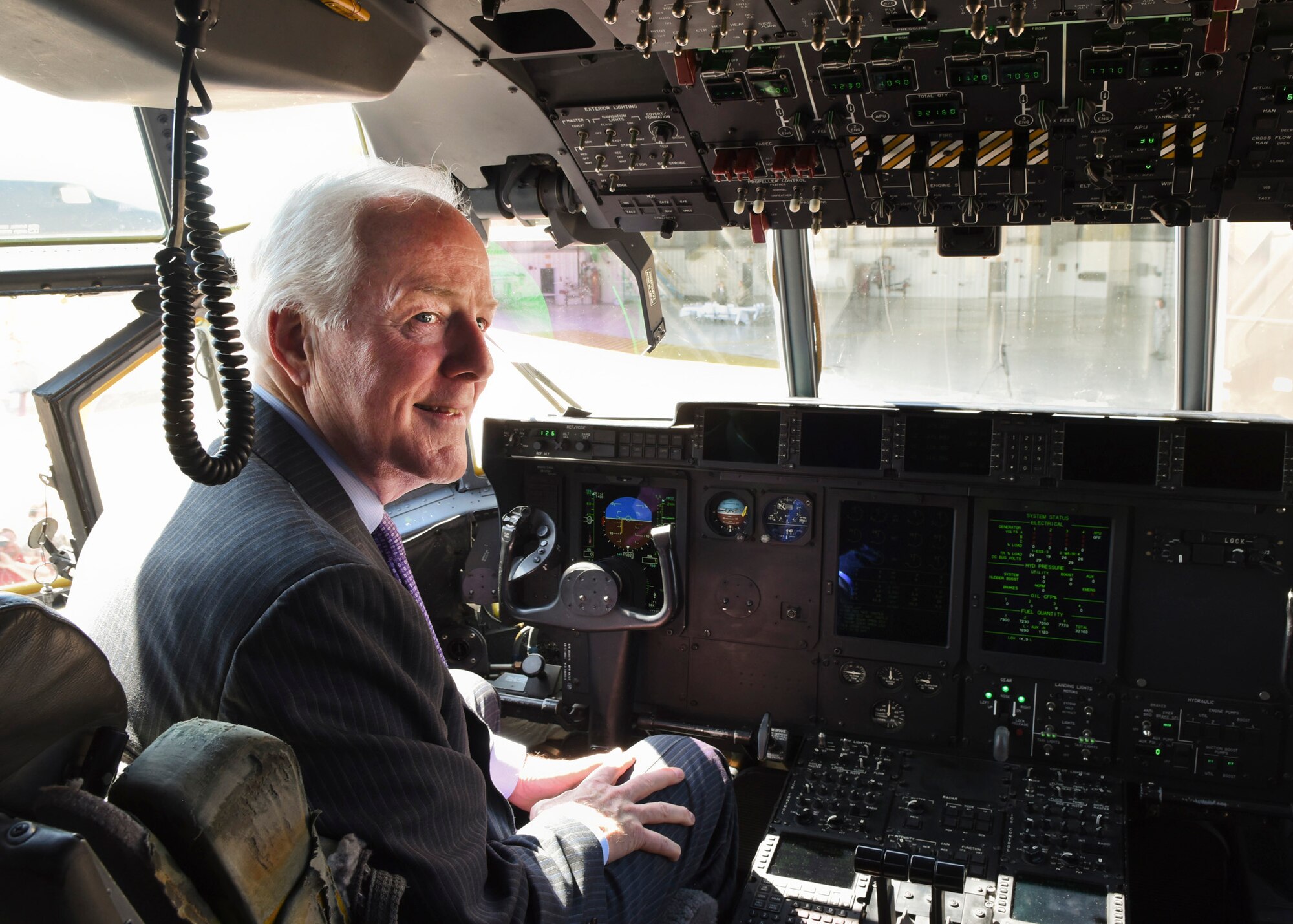 U.S. Sen. John Cornyn, R-TX, sits in the flight deck of C-130J Super Hercules at Dyess Air Force Base, Texas, April 18, 2017. Cornyn received a tour of the base including an up-close look at the cargo aircraft. (U.S. Air Force photo by Senior Airman Kedesha Pennant)
 
